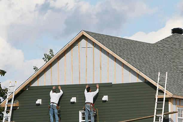 Professional Siding technician working in Highland, NY